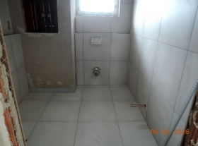  - Pokládka velkoformátových obkladů v koupelnách